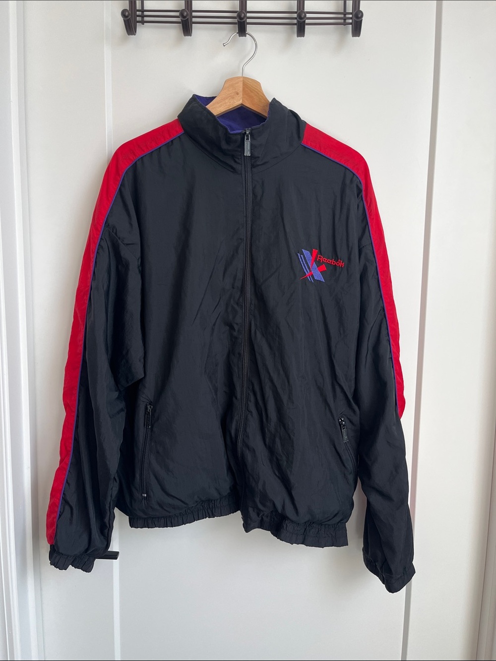 Vintage 90’s Reebok Black Windbreaker Jacket with Red Shoulder Stripes